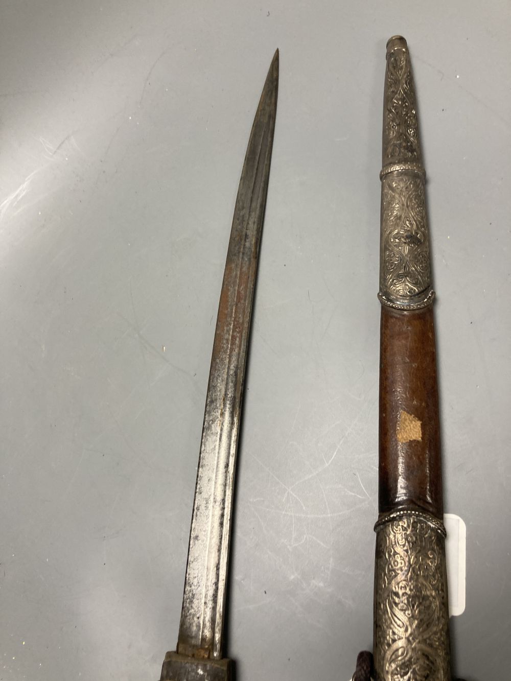 A late 19th century Moroccan rhino horn handled dagger, 57cm
